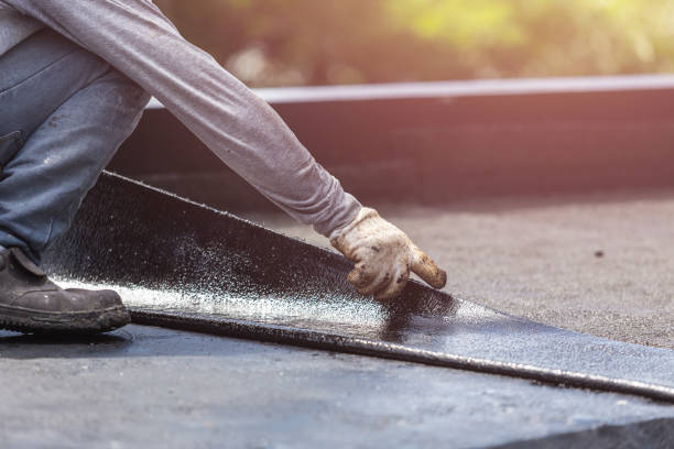 Professional Basement Waterproofing technician working in Two Rivers, WI